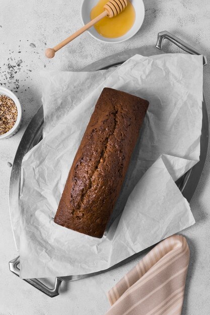 Top view sweet bread with honey and seeds