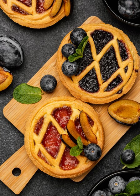 Top view of sweet pies with fruits