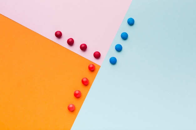 Top view sweets on colorful table