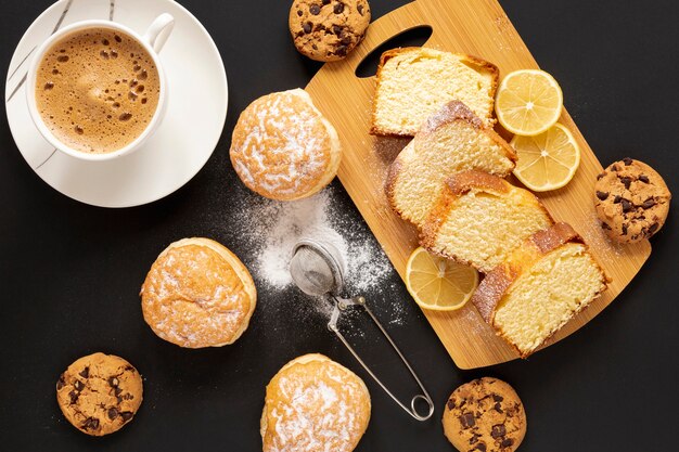 Top view sweets and a cup of coffee