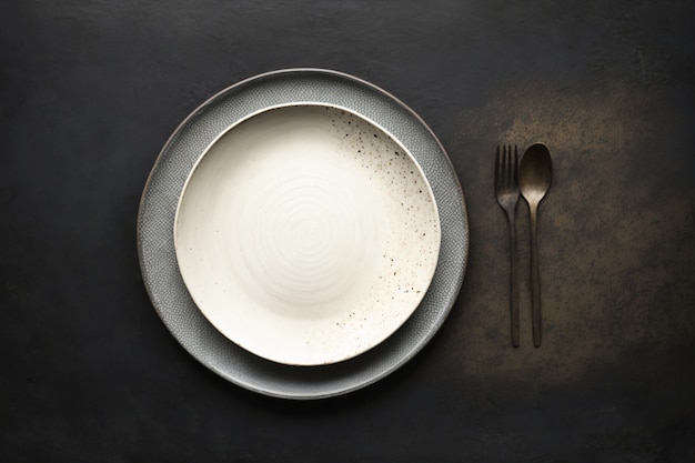 Top view of table arrangement with empty dishes and tableware