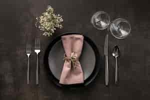 Free photo top view table assortment with plant