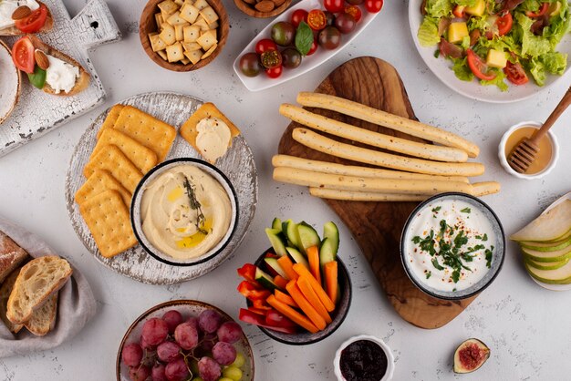 Top view table full of delicious food assortment