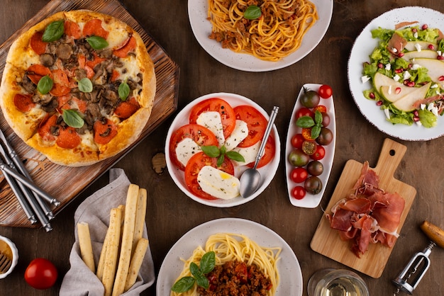 Top view table full of delicious food assortment