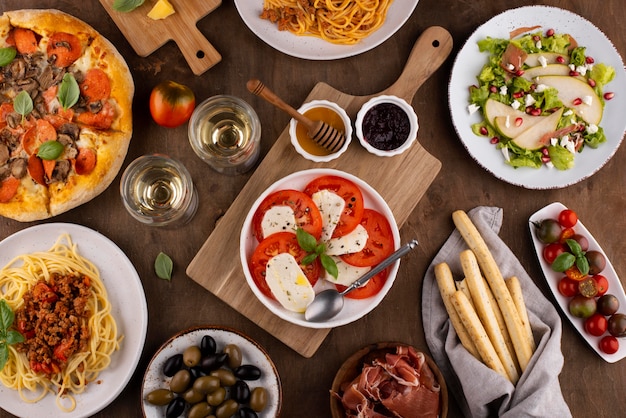 Top view table full of delicious food assortment