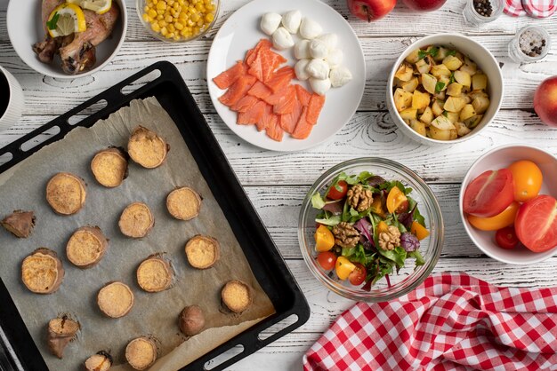 Top view on table full of various types of food