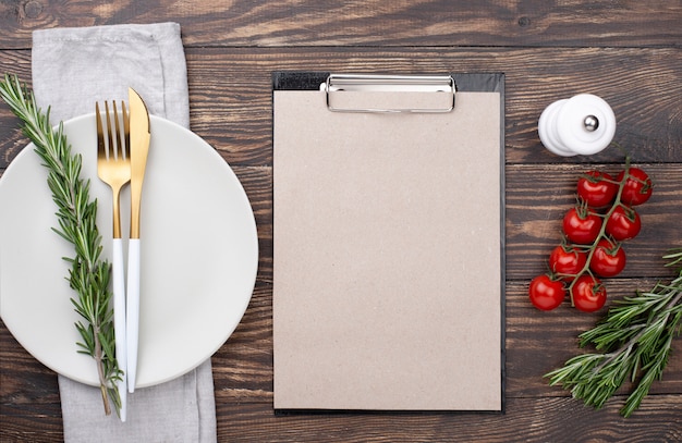 Top view table setting with clipboard