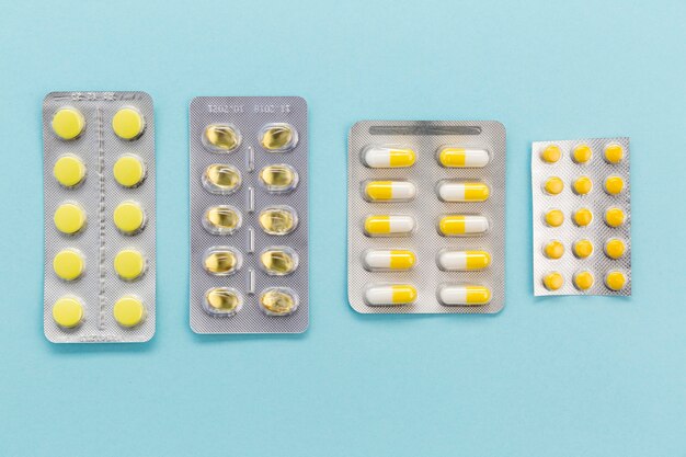 Top view tablets of pills on table