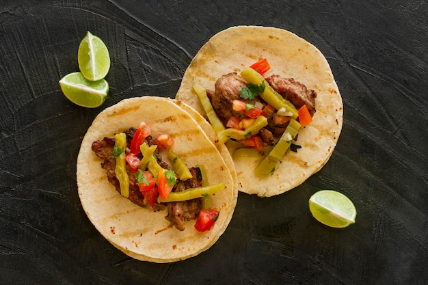 Top view tacos with meat and pickles