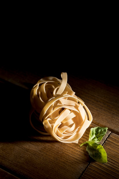 Top view tagliatelle with basil