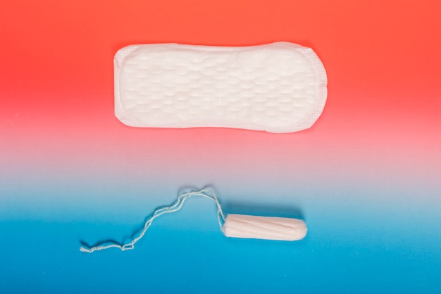 Free photo top view tampon and sanitary towel