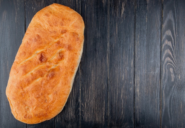 top view of tandir bread on wooden background with copy space