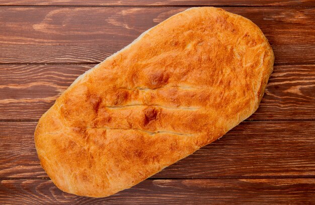 top view of tandir bread on wooden background