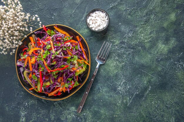 Top view tasty cabbage salad with peppers inside plate on dark background health bread snack meal diet lunch holiday food