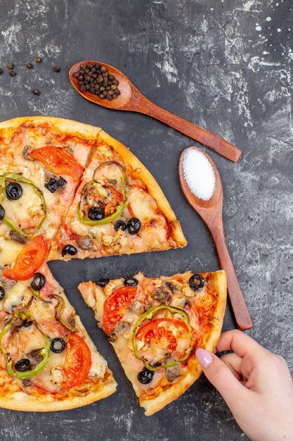 Top view tasty cheese pizza sliced and served on gray surface