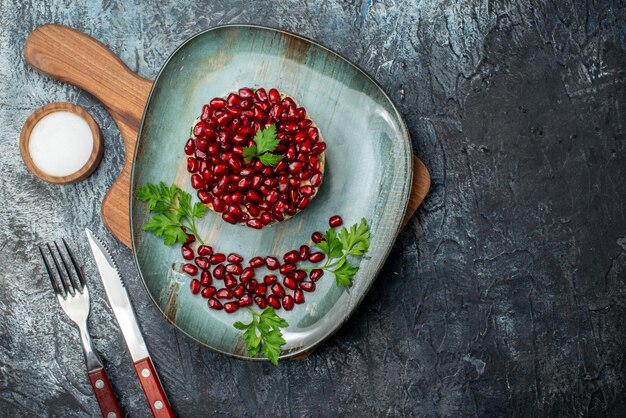 Top view tasty chicken salad with pomegranates on gray background salad food meal bread diet health fruit