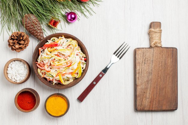 Top view tasty chicken salad with seasonings on a white desk meat fresh meal snack salad