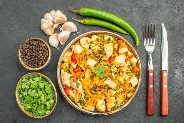 Top view tasty chicken salad with vegetables