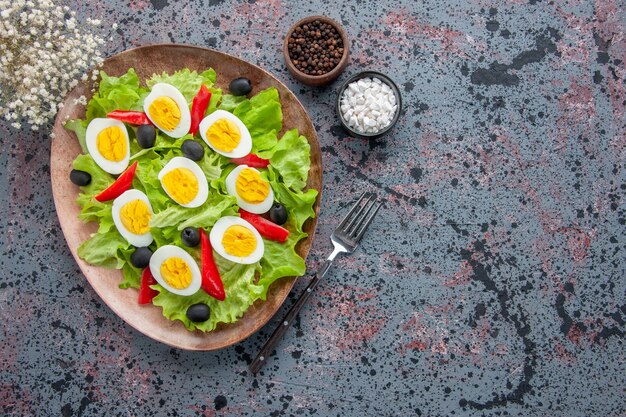 top view tasty egg salad with green salad and olives on light background