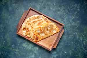 Free photo top view tasty gutabs thin hotcakes with meat inside desk on dark background color hotcake dough oven pie pastry cake