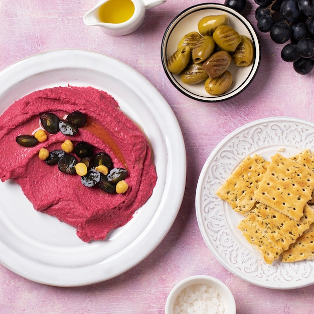 Top view tasty hummus on plate still life