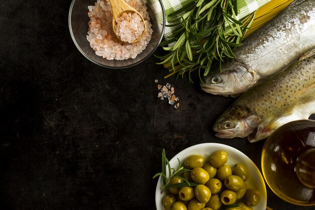 Top view of tasty ingredients on black surface