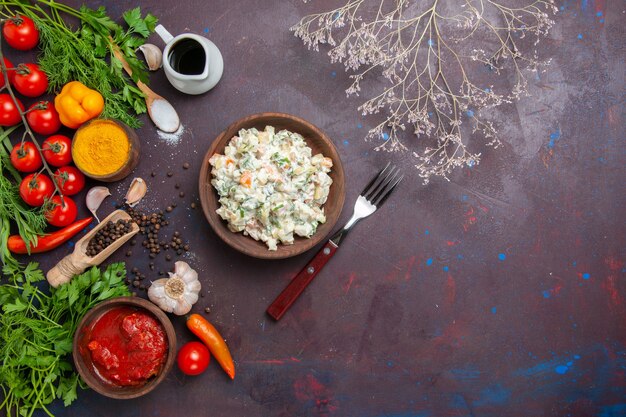 Top view tasty mayyonaise salad with greens and vegetables on dark background meal food salad snack lunch