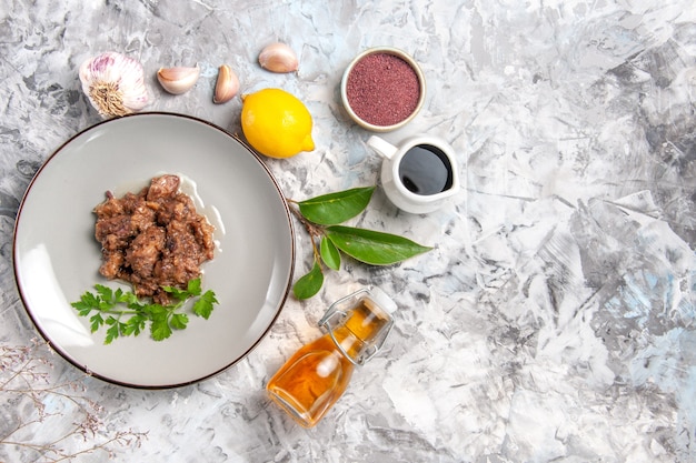 Top view tasty meat dish with sauce on white table dinner meal meat