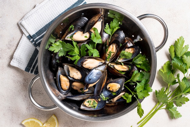 Top view tasty mussels with parsley