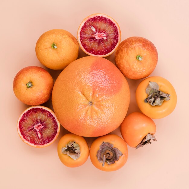 Top view tasty persimmons on the table