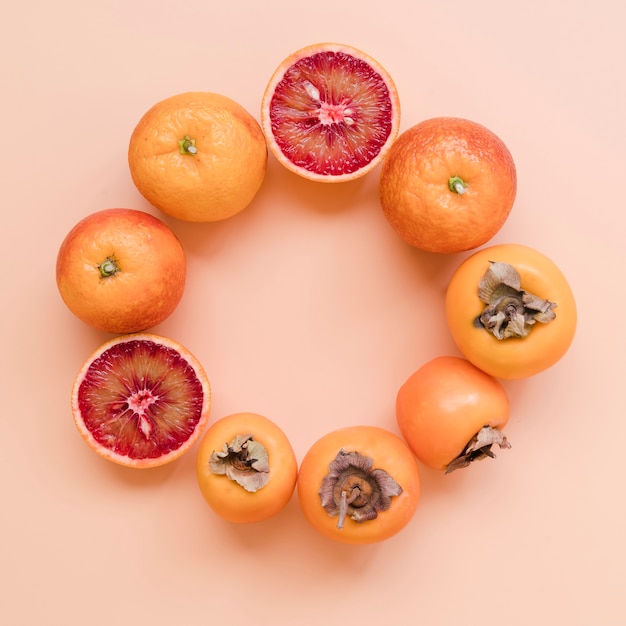 Top view tasty persimmons on the table