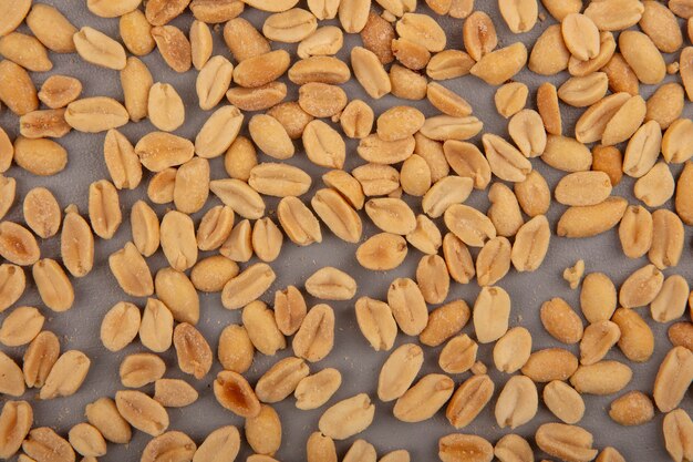 Top view of tasty roasted salty pine nuts isolated