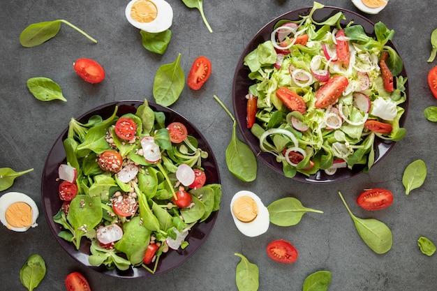 Top view tasty salad with boiled eggs