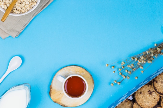 Top view tea cup with breakfast elements