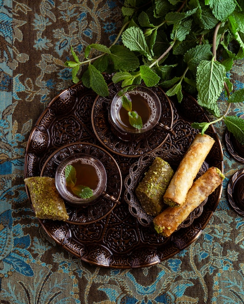 Top view tea cups and food arrangement