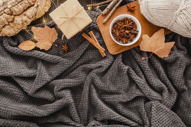 Top view tea with star anise and gift box on blanket