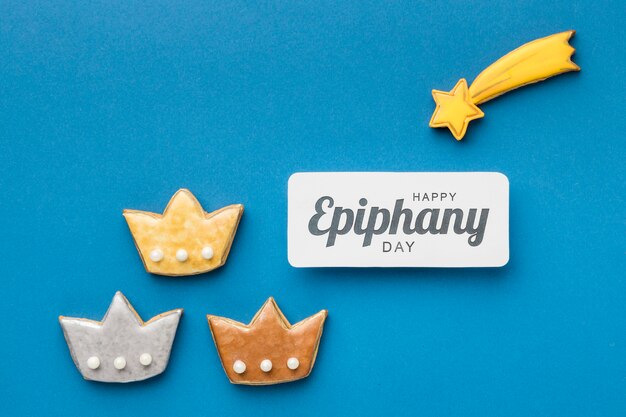 Top view of  three crowns with shooting star for epiphany day