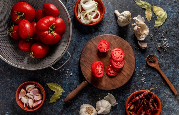 Top view of tomatoes with garlic and veggies