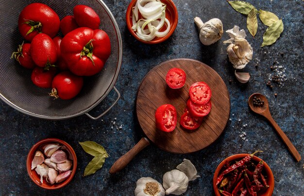 Top view of tomatoes with garlic and veggies