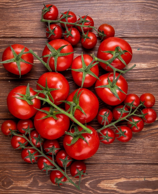 Top view of tomatoes on wood