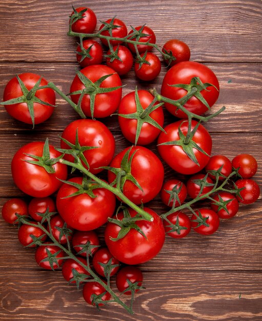 Top view of tomatoes on wood