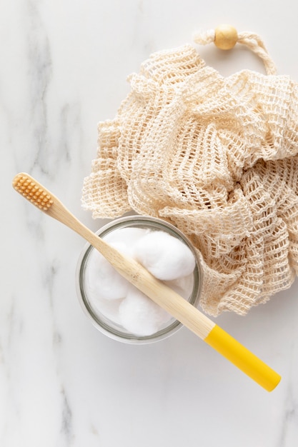 Free photo top view toothbrush and cotton