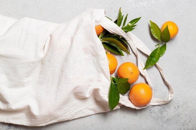 Top view tote bag with oranges