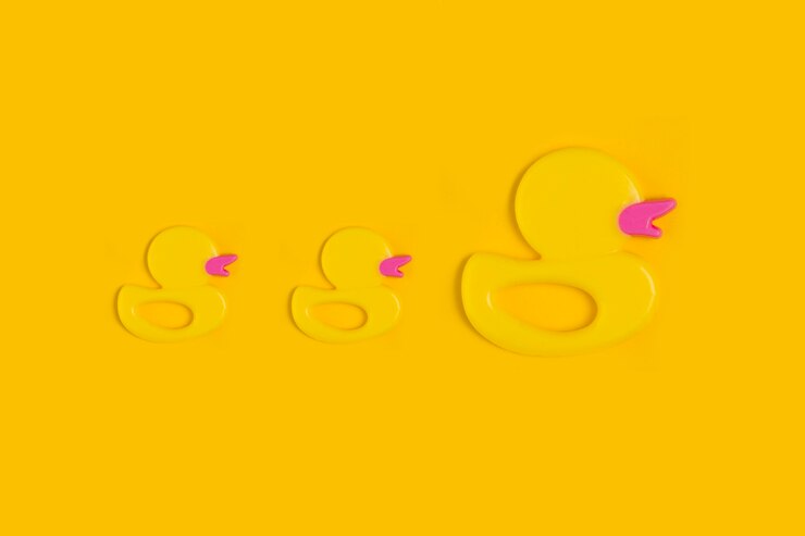 Free Photo top view of toy duckies for baby shower