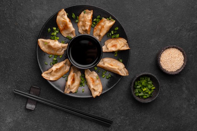 Top view of traditional asian meal with herbs