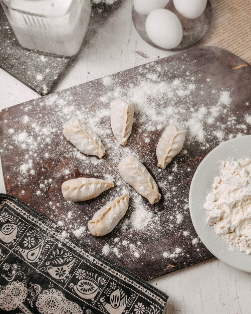 Top view of traditional azerbaijani gurza on a wooden cutting board