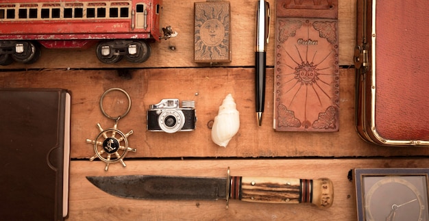 Top view travel items on wooden table