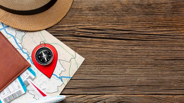 Top view travel kit on a wooden table