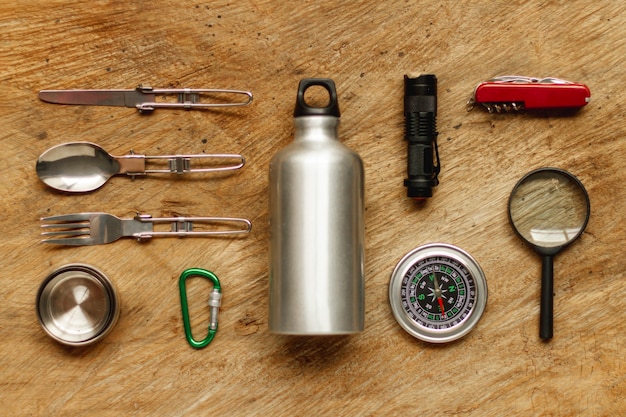 Top view traveler kit on wooden board