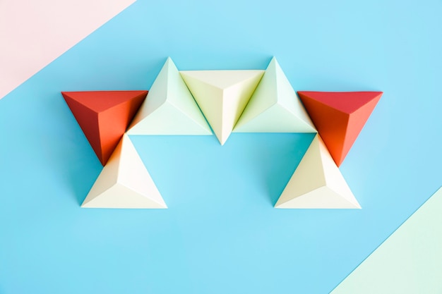 Top view triangle paper shape on desk